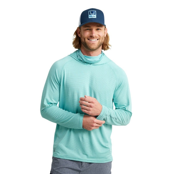 front view of a man wearing a marine blue huk fishing men's a1a performance sun hoody on a white background