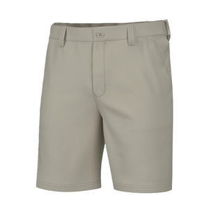 front view of a pair of khaki huk fishing mens pursuit 8.5 inch shorts on a white background