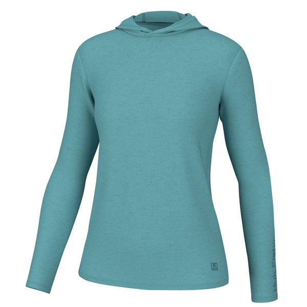 front view of a marine blue huk fishing womens waypoint performance long sleeved sun hoody on a white background