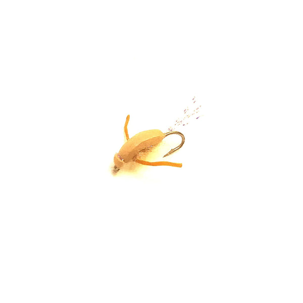 A tan Foam Boatman fly with a Krystal Flash tail, on a white background.