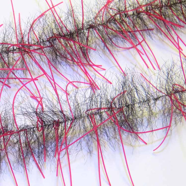 A pair of Just Add H2O Lively Legs Crustacean Brush in black and red on a white background.