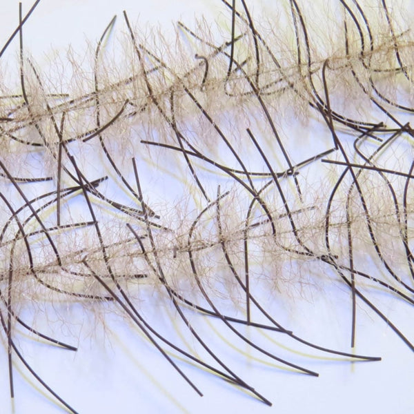 A pair of Just Add H2O Lively Legs Crustacean Brush in mullet brown and brown on a white background.