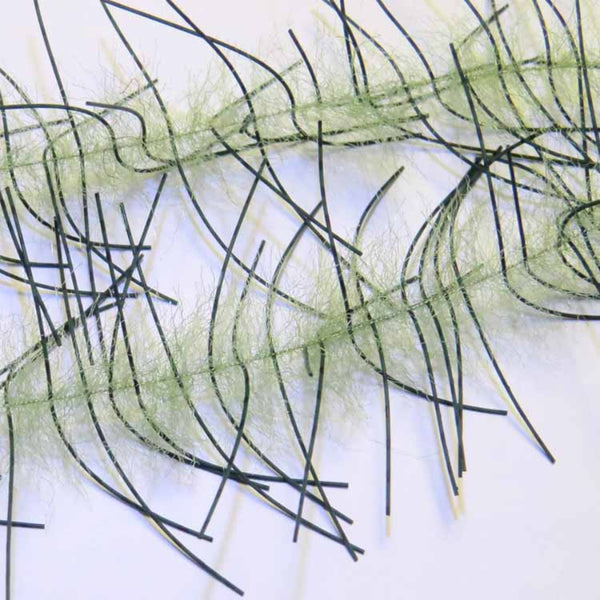 A pair of Just Add H2O Lively Legs Crustacean Brush in olive on a white background.