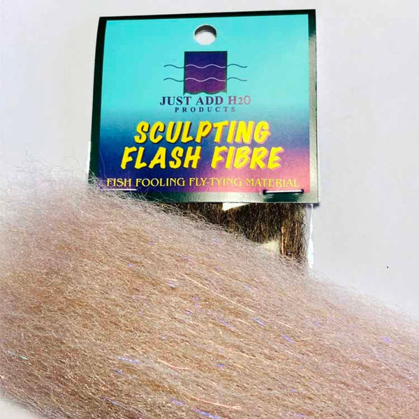 A package of Just Add H2O Sculpting flash fiber for fly tying with a skein of contrasting fiber on top, on a white background.