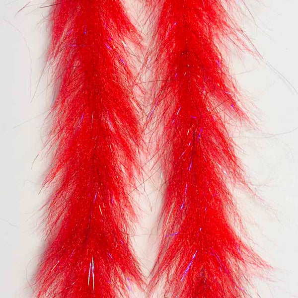 Close-up of a pair of bleeding red Just Add H2O Streamer Brush.