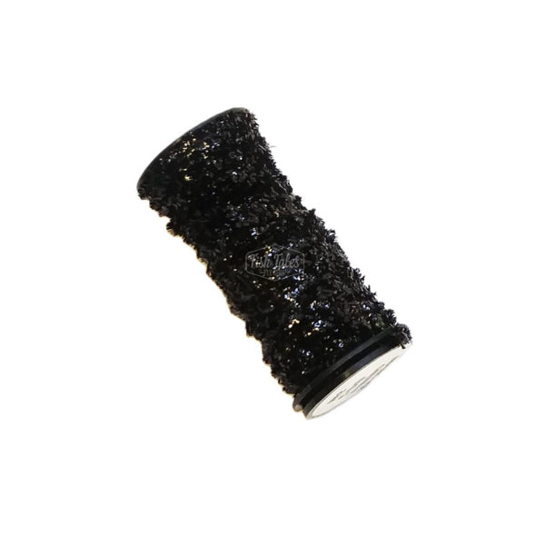 a spool of black kreinik micro ice chenille for fly tying on white background