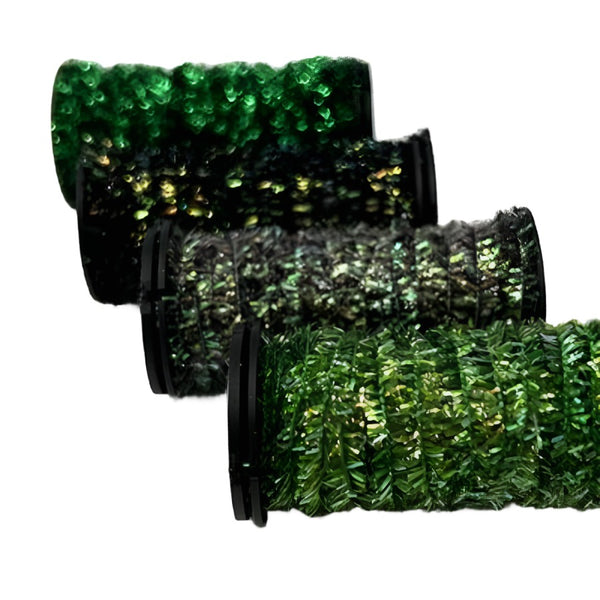 four green colors of kreinik micro ice chenille spooled for fly tying on white background