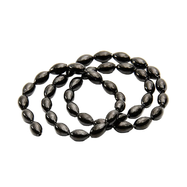 A coil of black MFC Bulb Chain Eyes for fly tying on a white background.