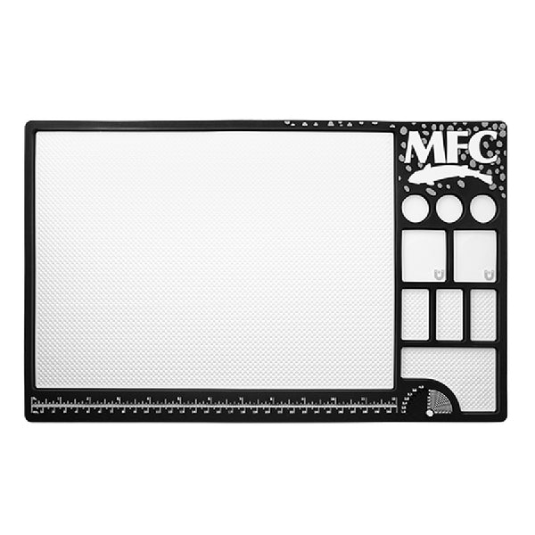 Black and white MFC Fly Tying Mat, showing the inset compartments and measurement features, on a white background.