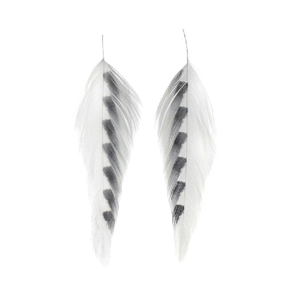 White and black matched pair of screen printed Shark Fin MFC Galloup's Fish Feathers schlappen feathers used for fly tying, displayed against a white background.