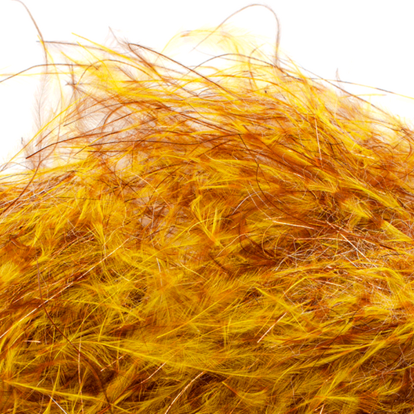 A close-up image of Senyo's Dirty Bird Dubbing, in JJ colors (yellow and brown) showcasing a mix of marabou and synthetic fibers with hints of flash.
