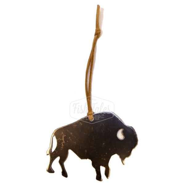 A Bison Silhouette MK Steel Canadian Animals ornament in dark steel with a leather hanger, in the shape of a walking bison with a bison horn cutout.