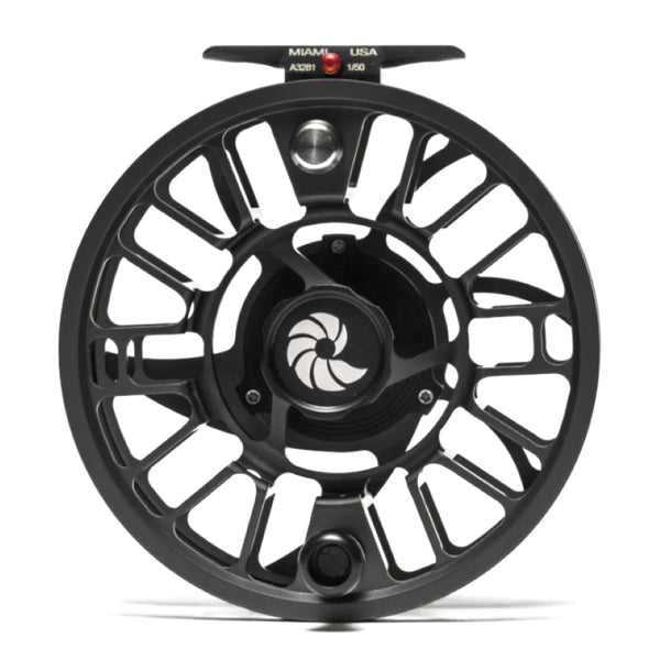A Nautilus GTX Saltwater Fly Reel with a black body and silver and red details on a white background.