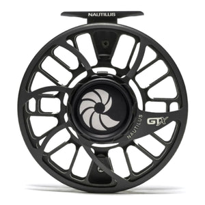 A Nautilus GTX Saltwater Fly Reel with a black body and silver and red details on a white background.