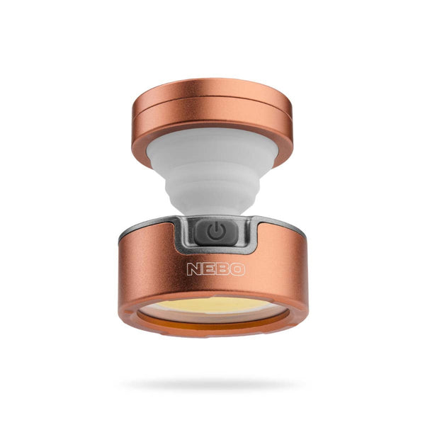 Unfolded Nebo Poppy Pocket Lantern in rose gold, on a white background.