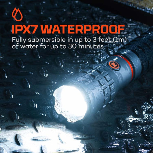A Nebo Skyde King 4k waterproof flashlight with water droplets and IPX7 rating on a wet surface.