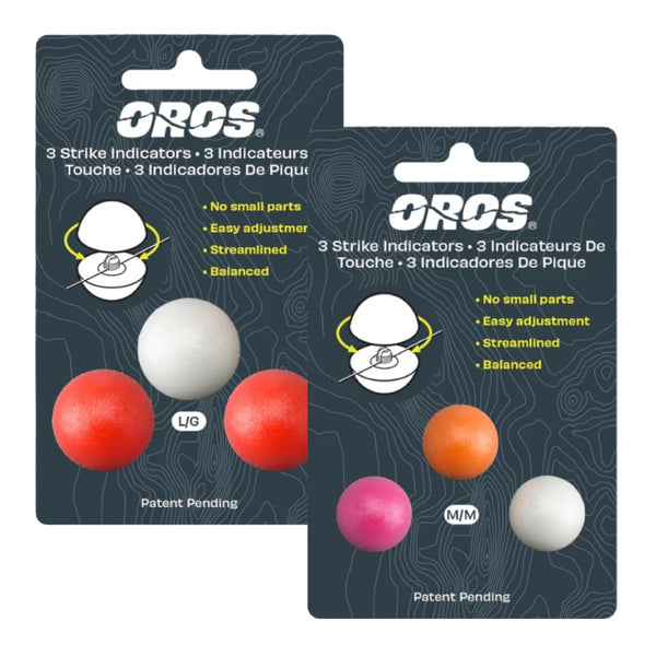 Two packages Oros Strike Indicators with three variously colored indicators each, for fly fishing on a white background.
