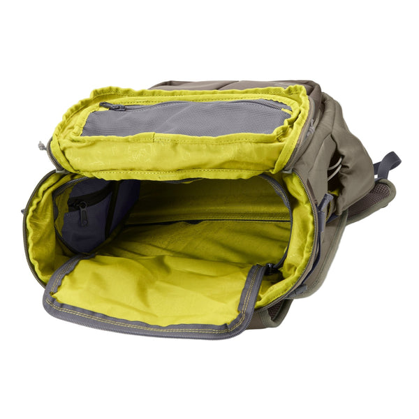 The inside of the Orvis Bug Out Backpack in dusty olive on a white background.