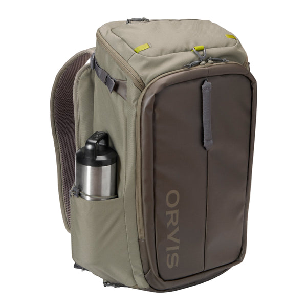 The Orvis Bug Out Backpack in dusty olive on a white background.