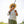 Person holding an Orvis Helios 50th Anniversary fly fishing rod with a blurred natural background.