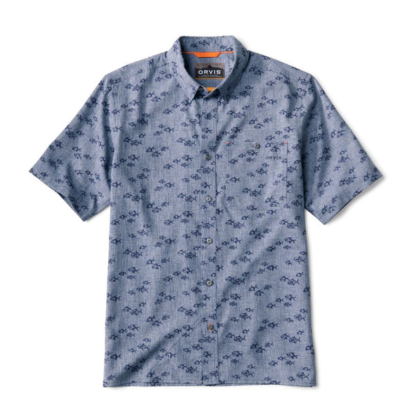 Front of the button down short sleeved men's Orvis Tech Chambray Shirt in medium blue with dark blue permit fish printed all over.