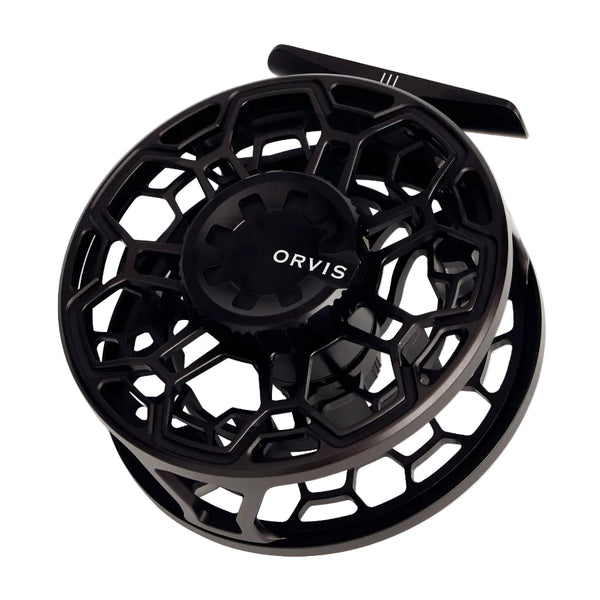 A black Orvis Ratio saltwater fly fishing reel on a white background.