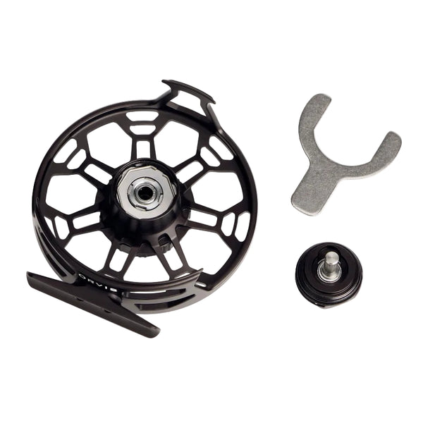 interior of a black Orvis Ratio saltwater fly fishing reel on a white background.