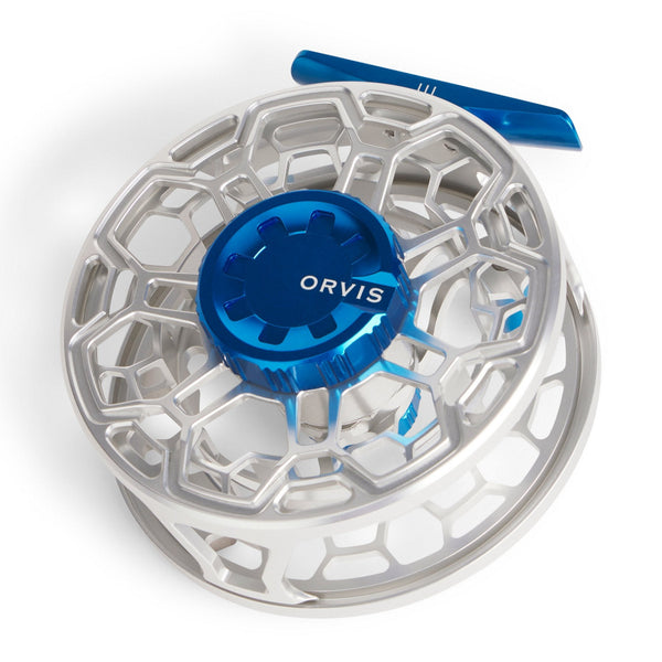 A silver and deep sea blue Orvis Ratio saltwater fly fishing reel on a white background.