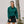 Woman wearing a Green Orvis Women's Open Air Caster Full Zip Sun Hoody standing next to a tree.