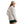 Woman wearing a white Orvis Open Air Caster Relaxed Sun Shirt and green shorts with a beige cap against a white background.