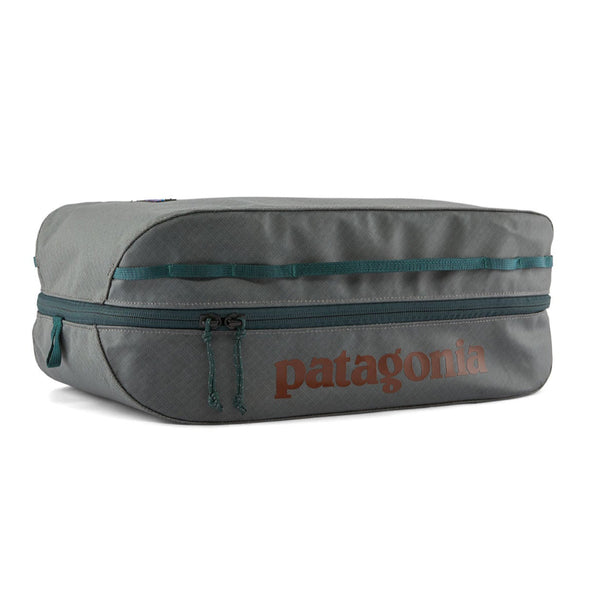 Patagonia Black Hole Cube 14-Liter in Noble Grey with rust red logo on a white background.