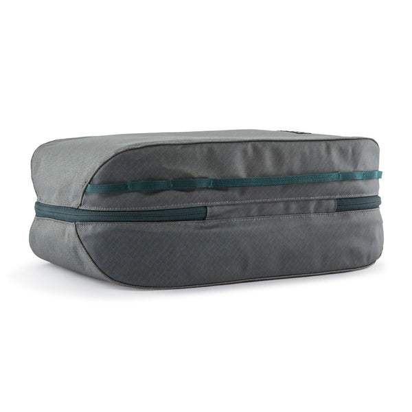 Back side of the Patagonia Black Hole Cube 14-Liter in Noble Grey on a white background.