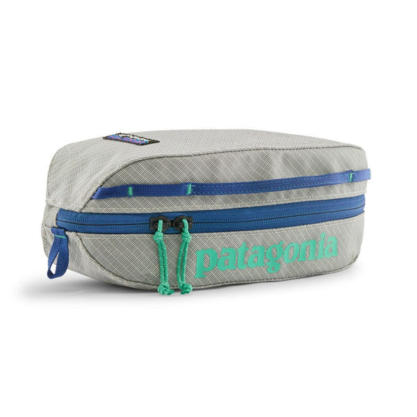 Patagonia Black Hole Cube 3-Liter in Birch White with teal logo on a white background.