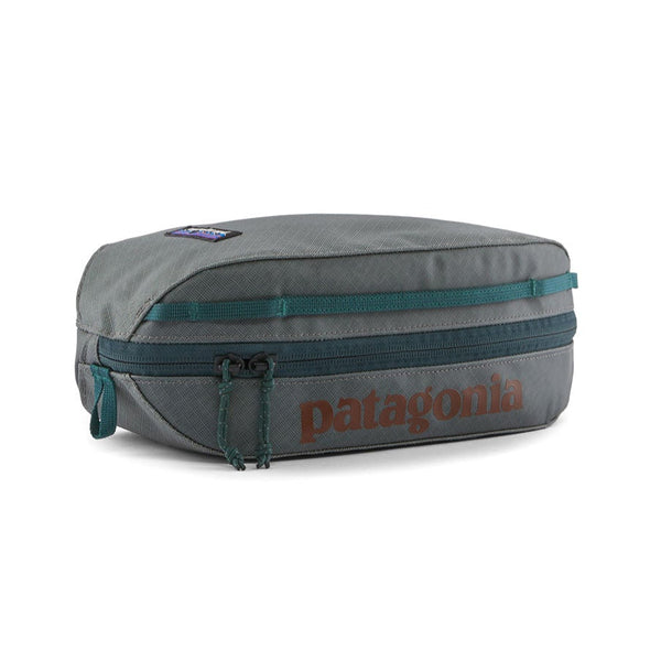 Patagonia Black Hole Cube 3-Liter in Noble Grey with rust red logo on a white background.