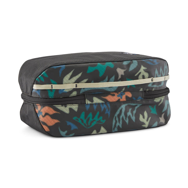 Patagonia Black Hole Cube 6-Liter with colorful kaleido black pattern, on a white background.