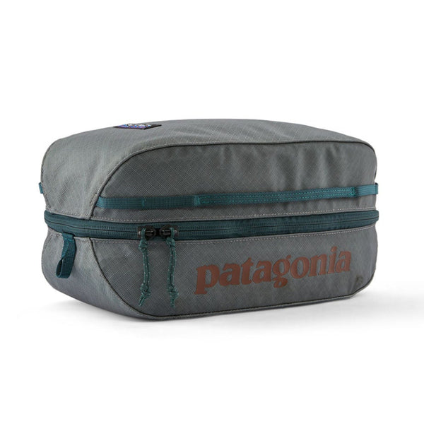 Patagonia Black Hole Cube 6-Liter in Noble Grey with rust red logo on a white background.