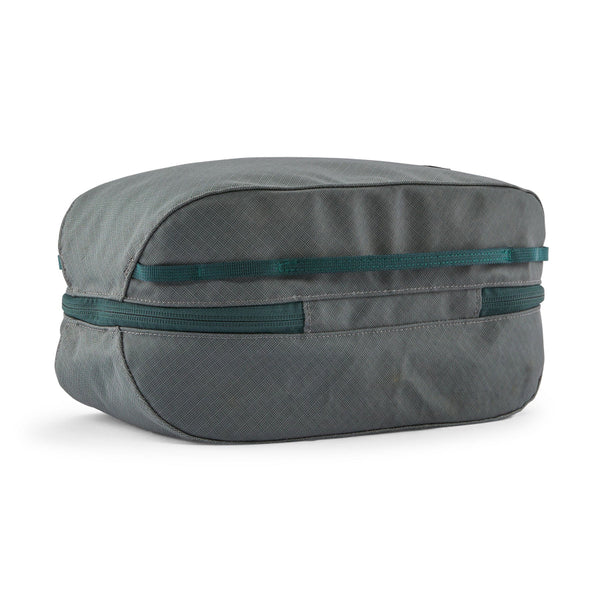 Back side of the Patagonia Black Hole Cube 6-Liter in Noble Grey on a white background.