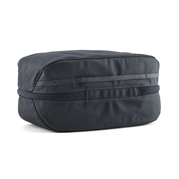 Patagonia Black Hole Cube 6-Liter in Smolder Blue showing back side of item on a white background.