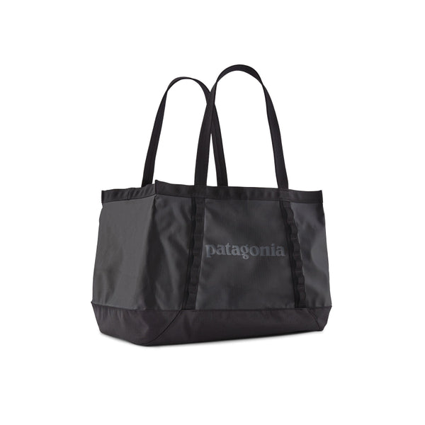The 25-liter Patagonia Black Hole Gear Tote in black with black on a white background.