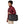 A person wearing a Black Patagonia Black Hole Micro MLC backpack with the side strap on a white background.