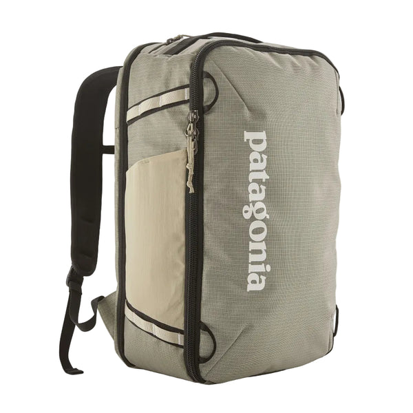 A weathered stone color Patagonia Black Hole Mini MLC Backpack 30L on a white background.