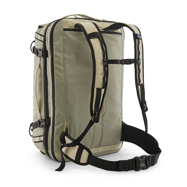 Back view of the weathered stone Patagonia Black Hole MLC Briefcase Backpack 45L on a white background.