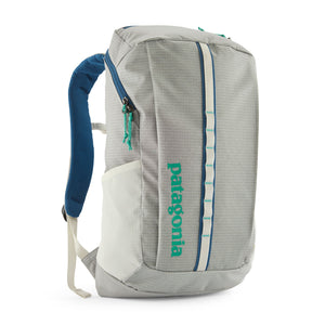 The 25-liter Patagonia Black Hole Backpack in Birch White with blue accents, shown from the front on a white background.