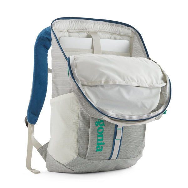 The 25-liter Patagonia Black Hole Backpack in Birch White with blue accents, shown from the front with the main zipper open on a white background.