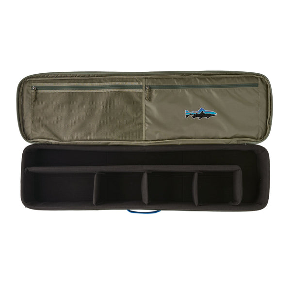 A basin green Patagonia Black Hole Fly Fishing Rod Case open showing adjustable compartments and a visible Fitz Roy Trout brand logo on upper zippered pockets, on a white background.