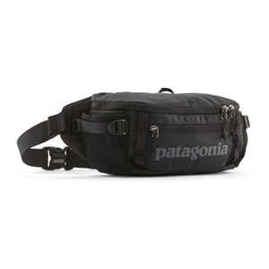 Patagonia Black Hole Waist Pack showing the Patagonia logo on the side, on a white background.