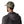 Man wearing a Patagonia jacket and Patagonia Broadcaster Trucker Hat in River Rock Green showing the camo mesh back on a white background.