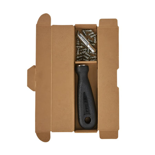 Patagonia Grip Studs Traction Kit packaging in brown open with studs and driver inside, on a white background.