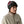 Person wearing a grey Patagonia Fun Hog Knit beanie with colorful salmon designs, and a light tan jacket over a white background.