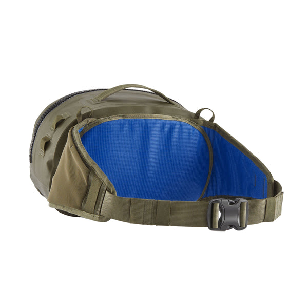 Back view of the Patagonia Guidewater Waterproof Fishing Hip Pack in Basin Green with blue accents on a white background.